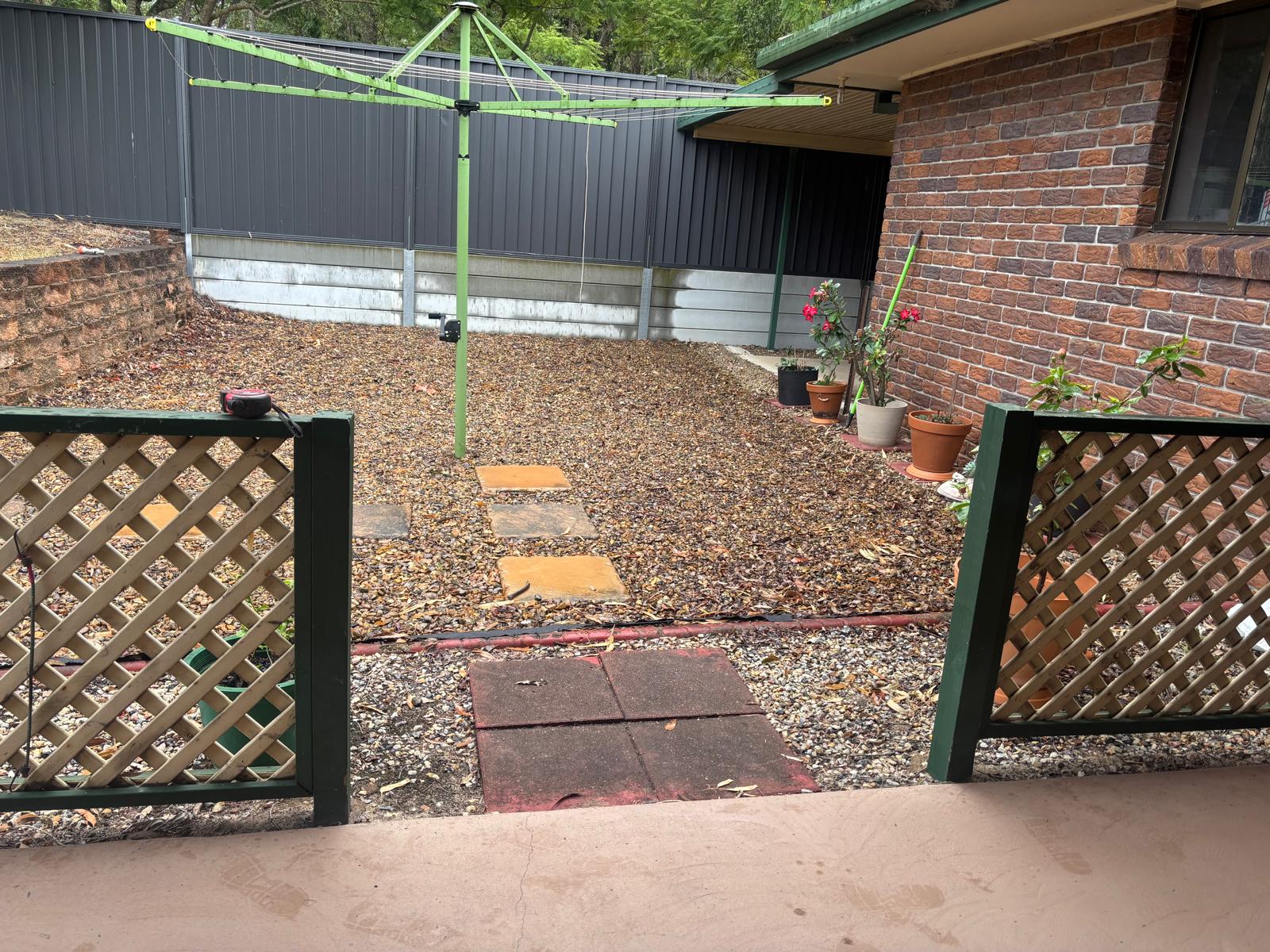 Colourbond fence enclosing residential backyard