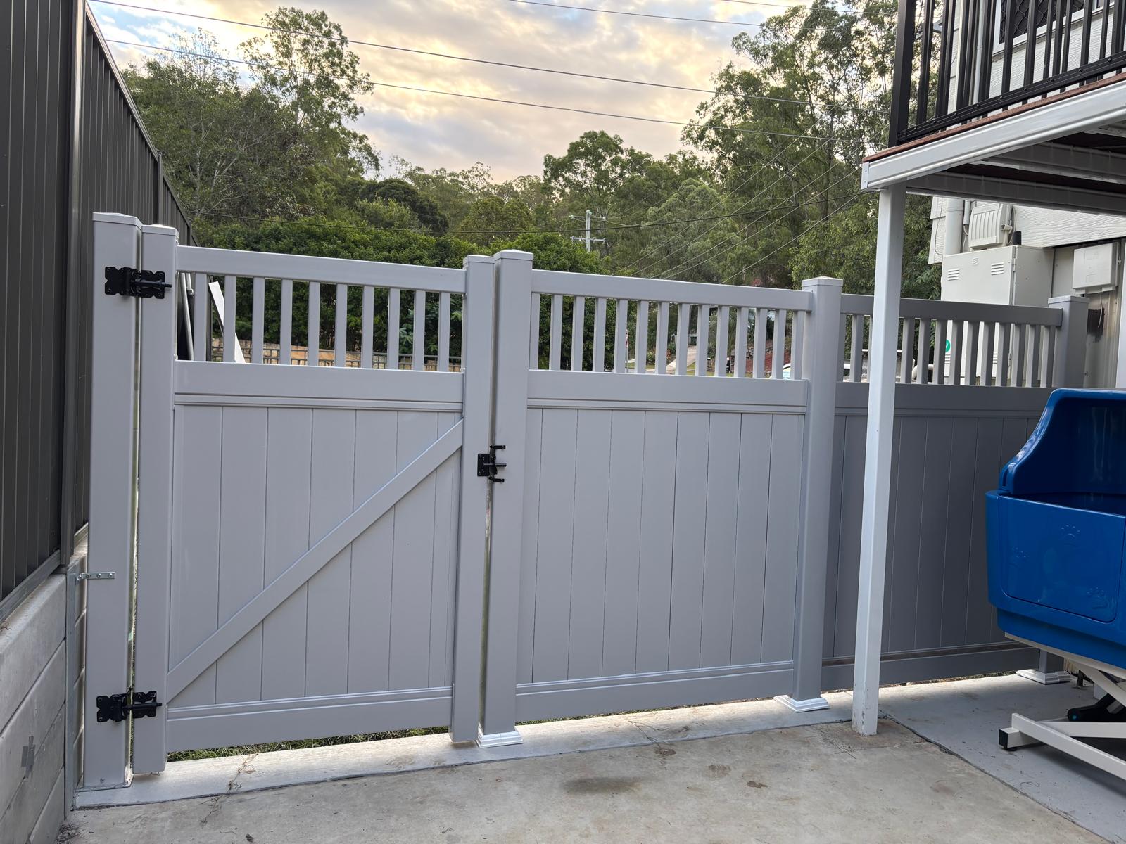Grey PVC gate and fence installation