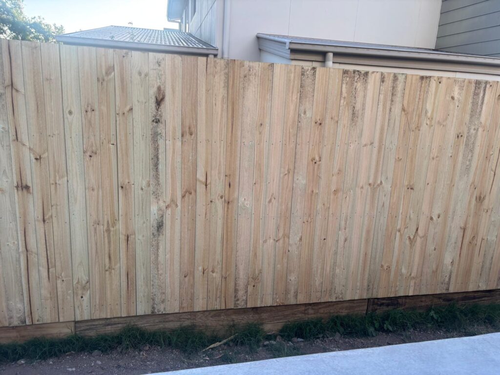New timber boundary palings beside the neighbouring home in Richlands