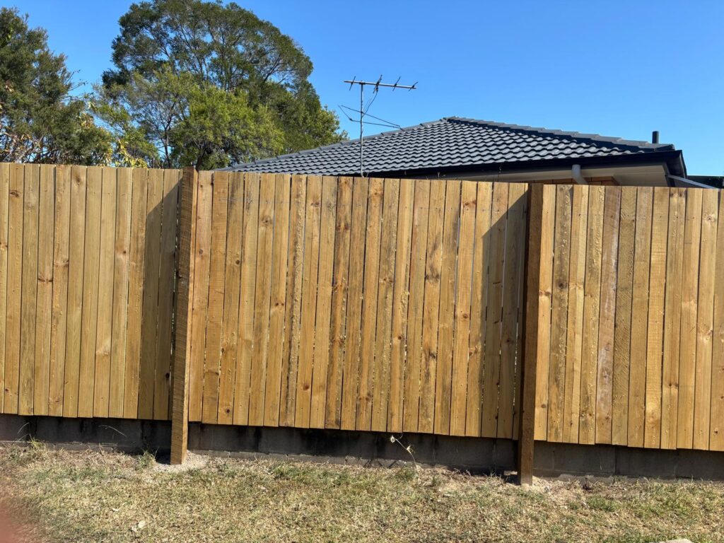 Hampton style timber fence with solid hardwood posts in Jindalee